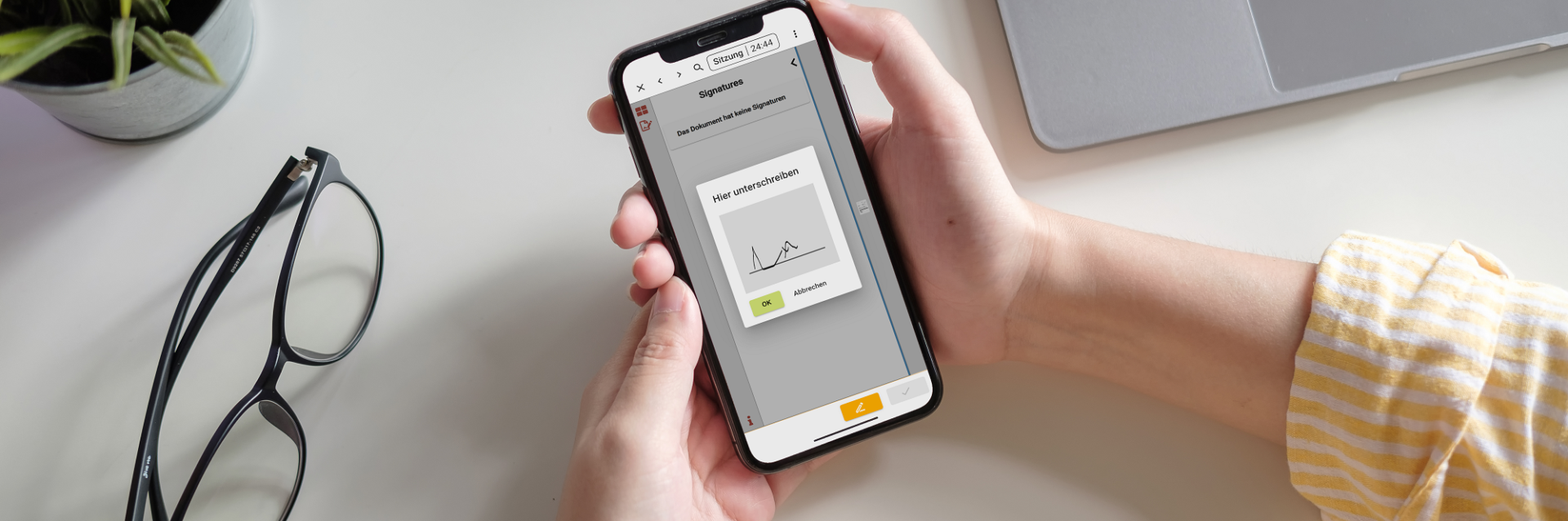 Handy mit App zur digitalen Unterschrift
