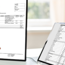 Beitragsbild zum Thema E Rechnung validieren mit digitaler Rechnung auf zwei Bildschirmen im Büro