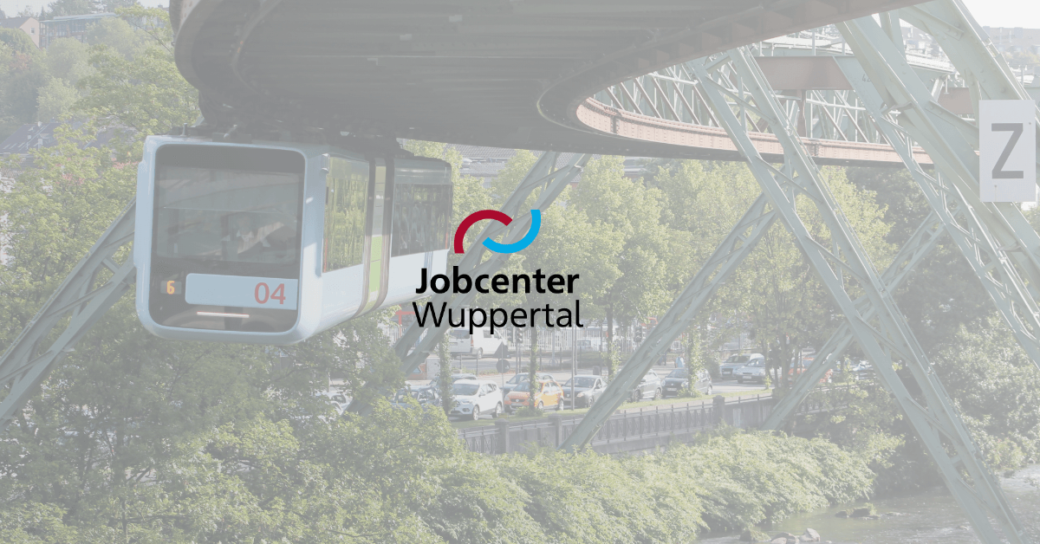 Schwebebahn Stadt Wuppertal mit Logo des Jobcenters Wuppertal
